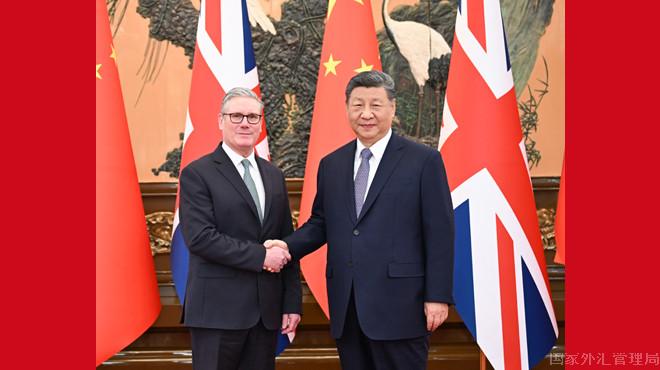 习近平会见英国首相斯塔默