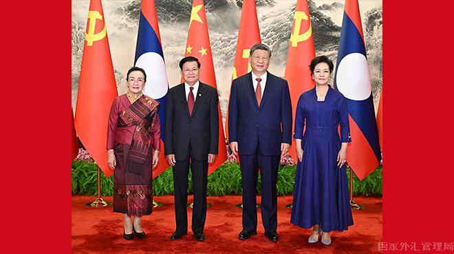 习近平同老挝人民革命党中央总书记、国家主席通伦举行...
